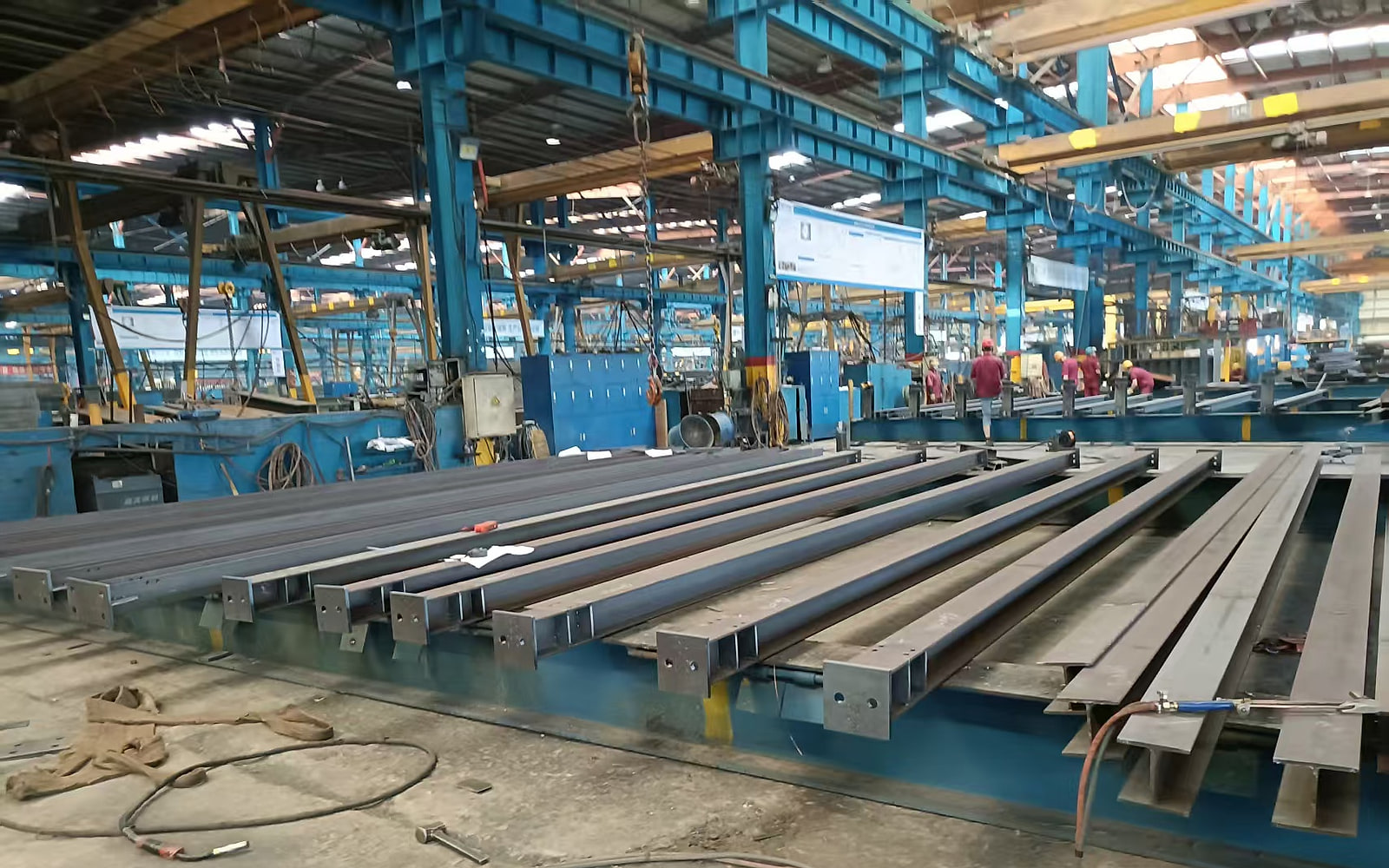 Structural steel profiles on a fabrication line