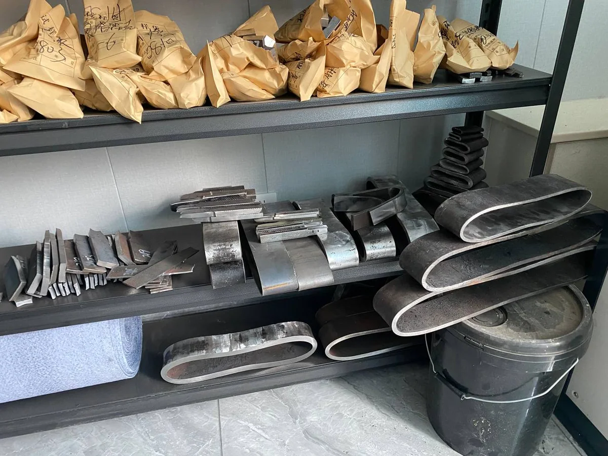 Metal test specimens stored on shelves in the quality laboratory